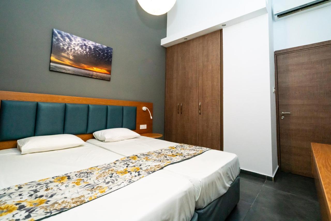 Helios Bay Hotel And Suites Klorakas Esterno foto