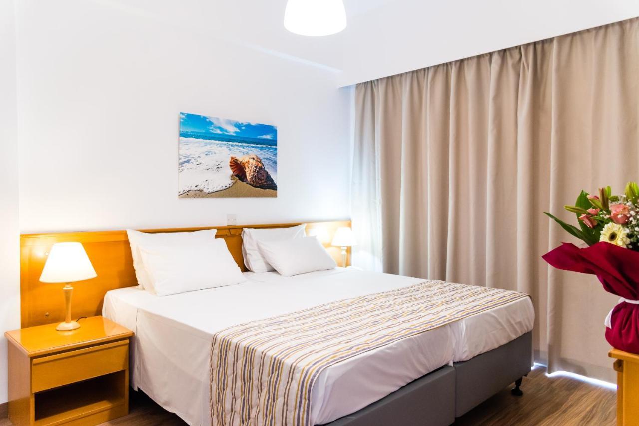Helios Bay Hotel And Suites Klorakas Esterno foto